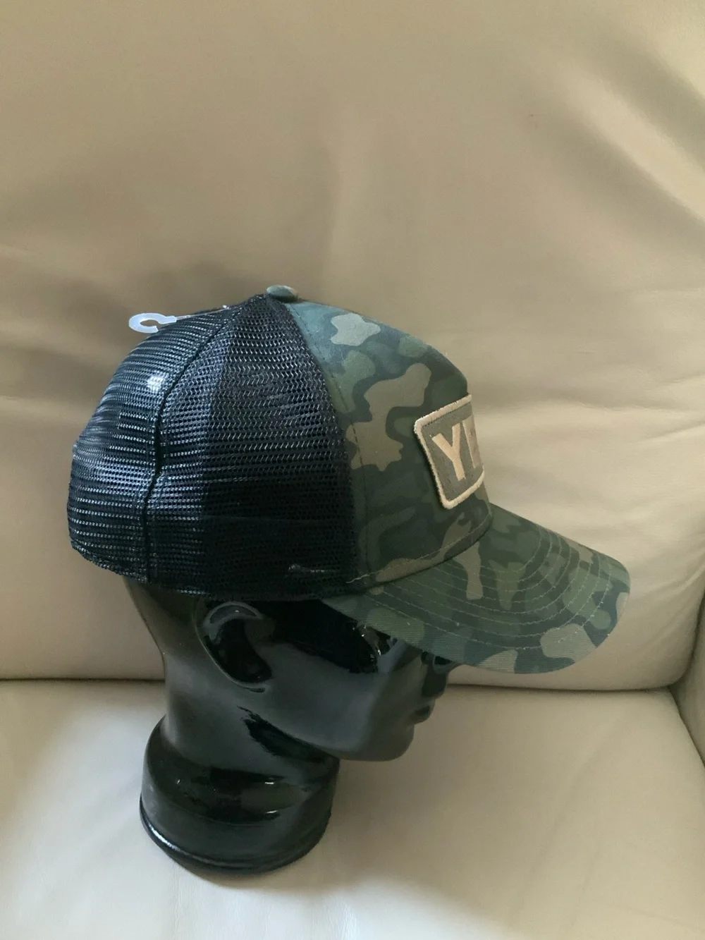 Yeti Green Camo Patch Trucker hunting Cap. Mesh and adjustable strap. NWOT.